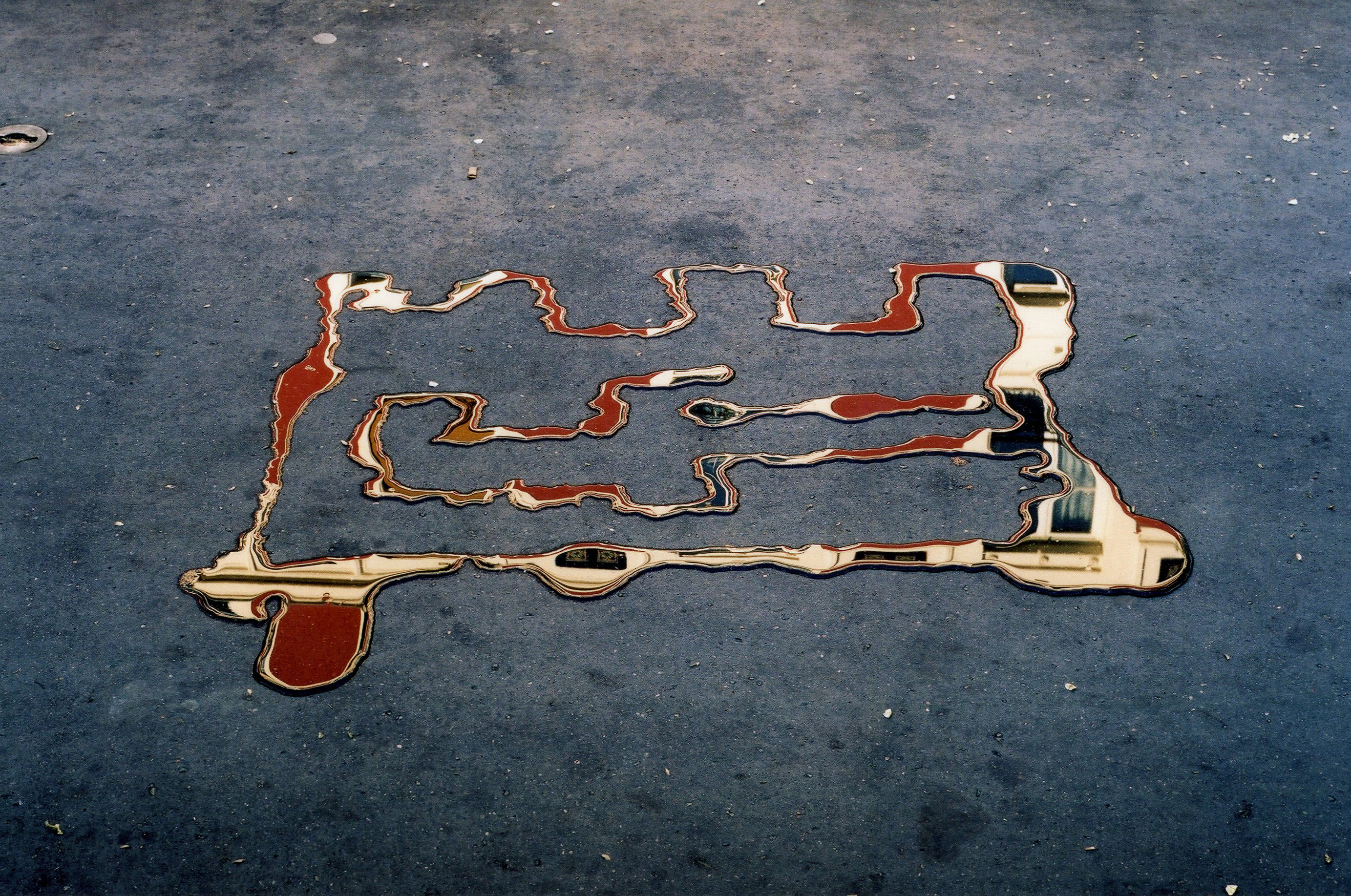 Asphalte, lumière, eau